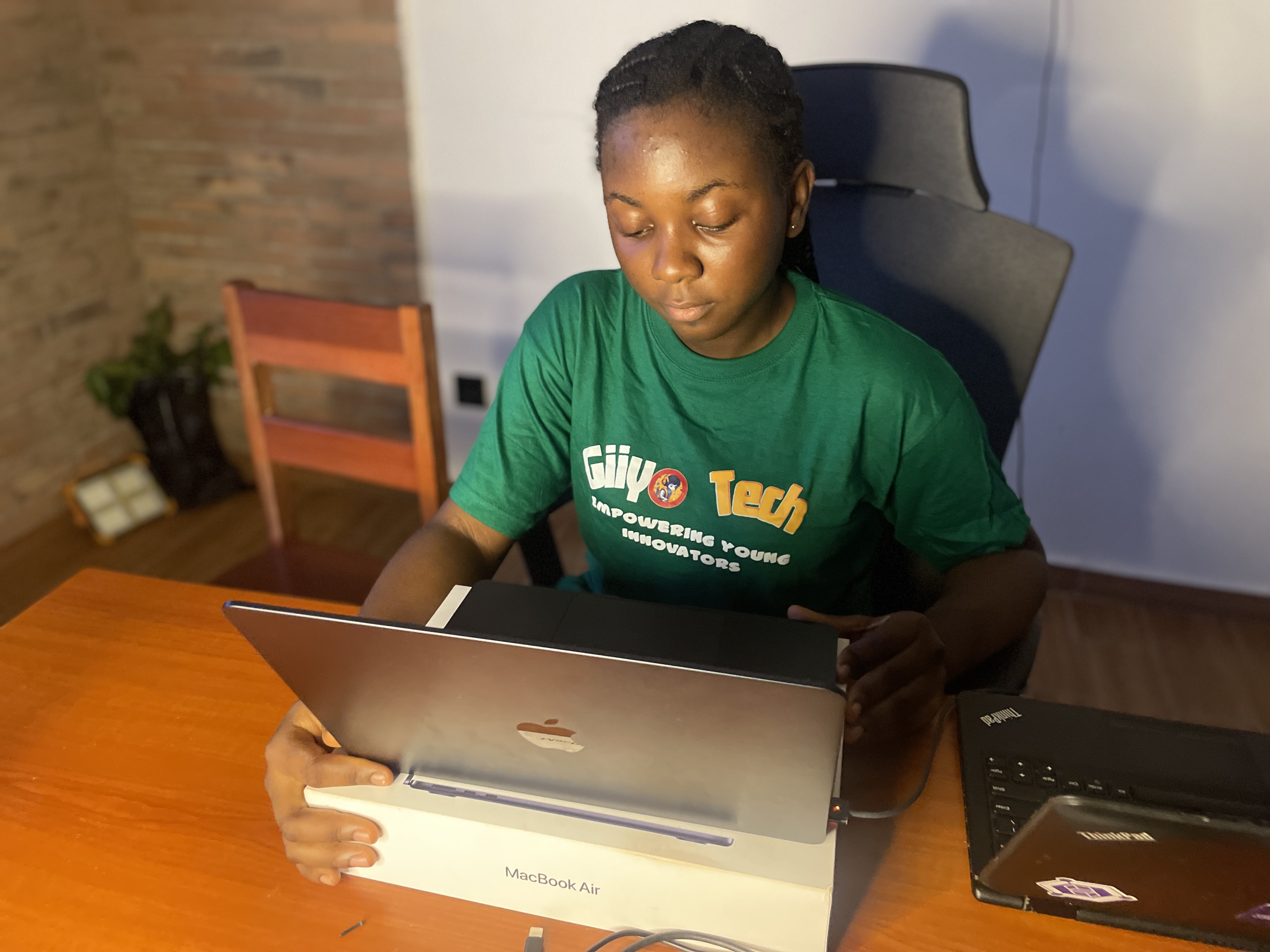 Alexia working on her laptop